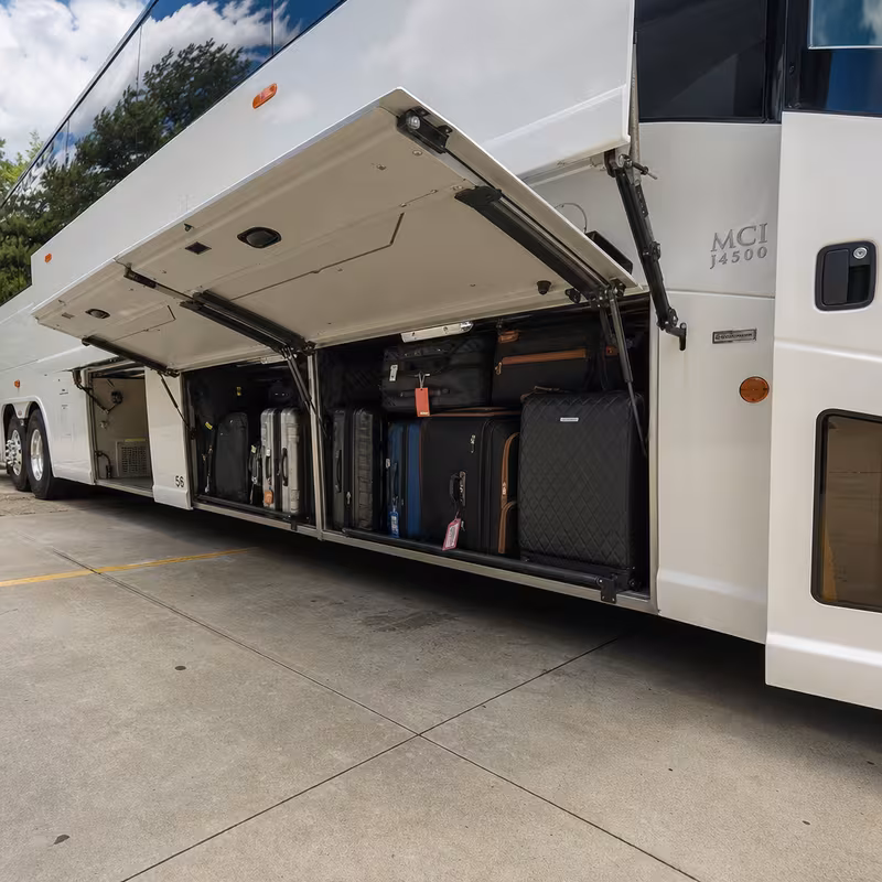 Party bus interior with wraparound leather seating and LED lighting in Detroit